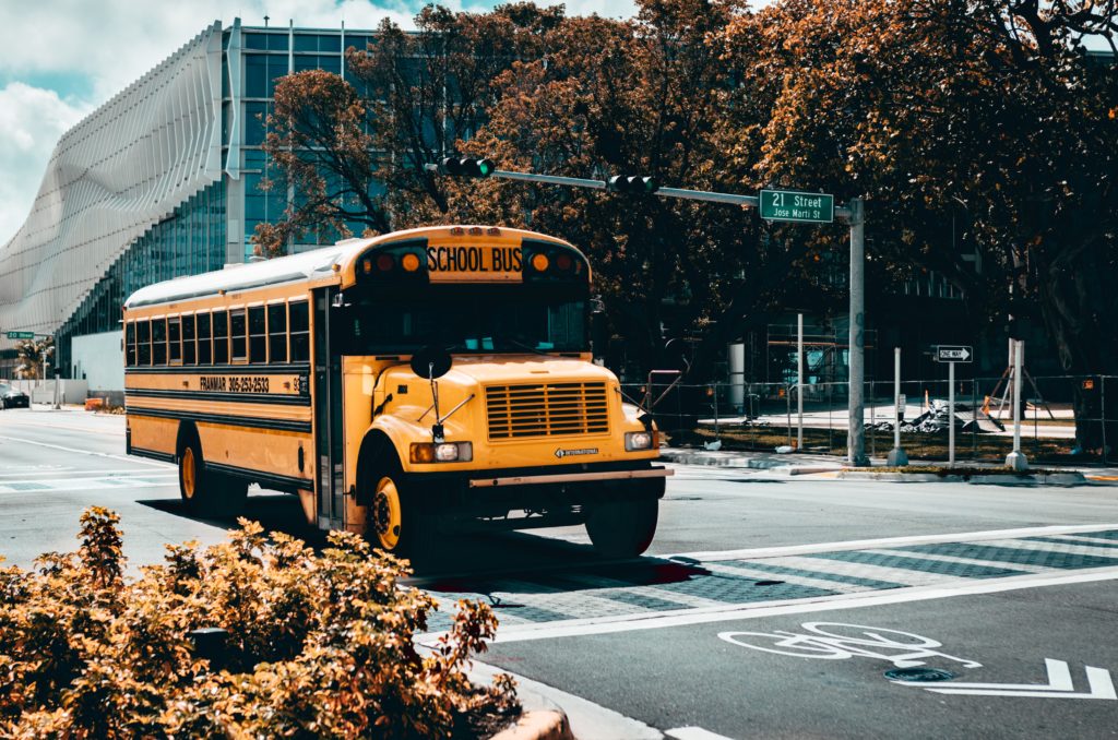 yellow school bus on road